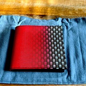 Alexander McQueen bi-fold wallet - never used - box missing - only duster.